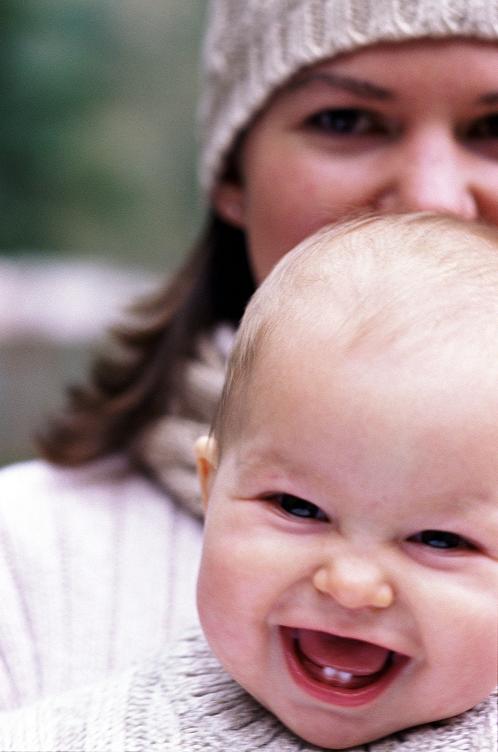 laughing baby with mom
